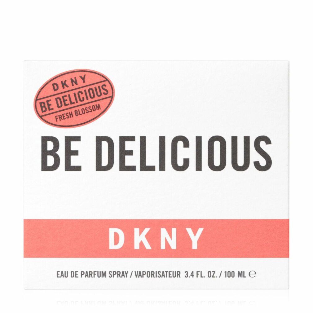 Confezione bianca con scritta: DKNY Be Delicious Fresh Blossom. Striscia rossa e logo.