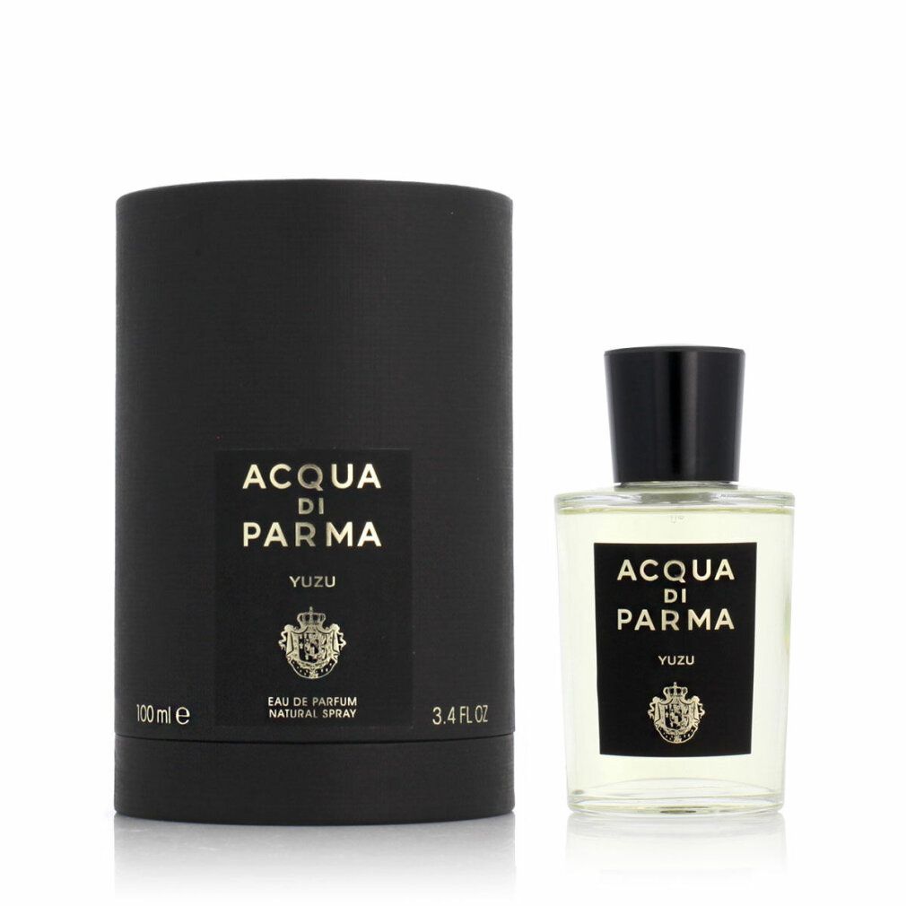 Flacone in vetro e confezione cilindrica nera. Flacone con etichetta nera: Acqua di Parma Yuzu. Tappo nero.