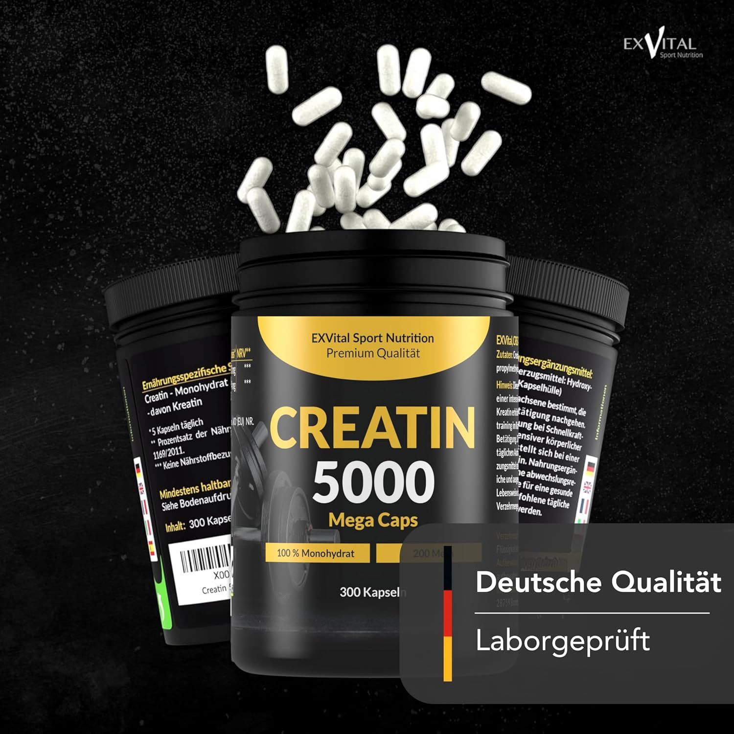 Tre barattoli neri con etichette gialle. Scritta: Creatina 5000 Mega Caps. 300 capsule. Testo: 100% Monoidrato, 200 Mesh.