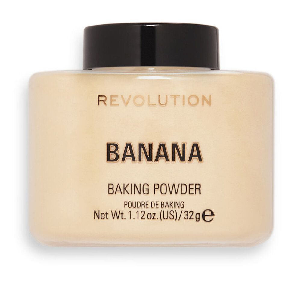 Contenitore di polvere beige con coperchio nero. Scritta: REVOLUTION, BANANA, BAKING POWDER, Net Wt. 1.12 oz. (US)/32g e.
