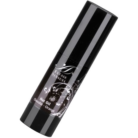 Flacone nero di olio da massaggio scuro, tappo nero ed etichetta floreale.
