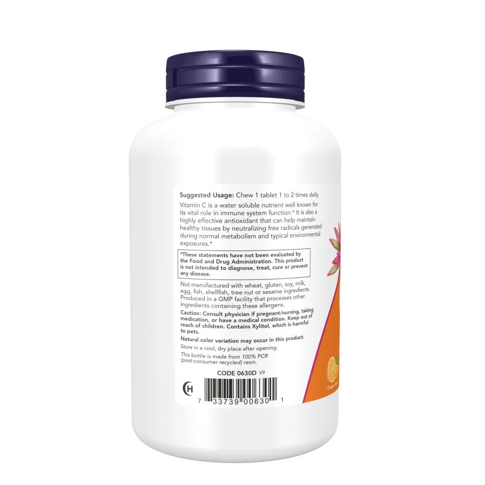 Retro del flacone di vitamina C-500. Contiene istruzioni per l'uso e avvertenze. Contenitore bianco con coperchio viola.