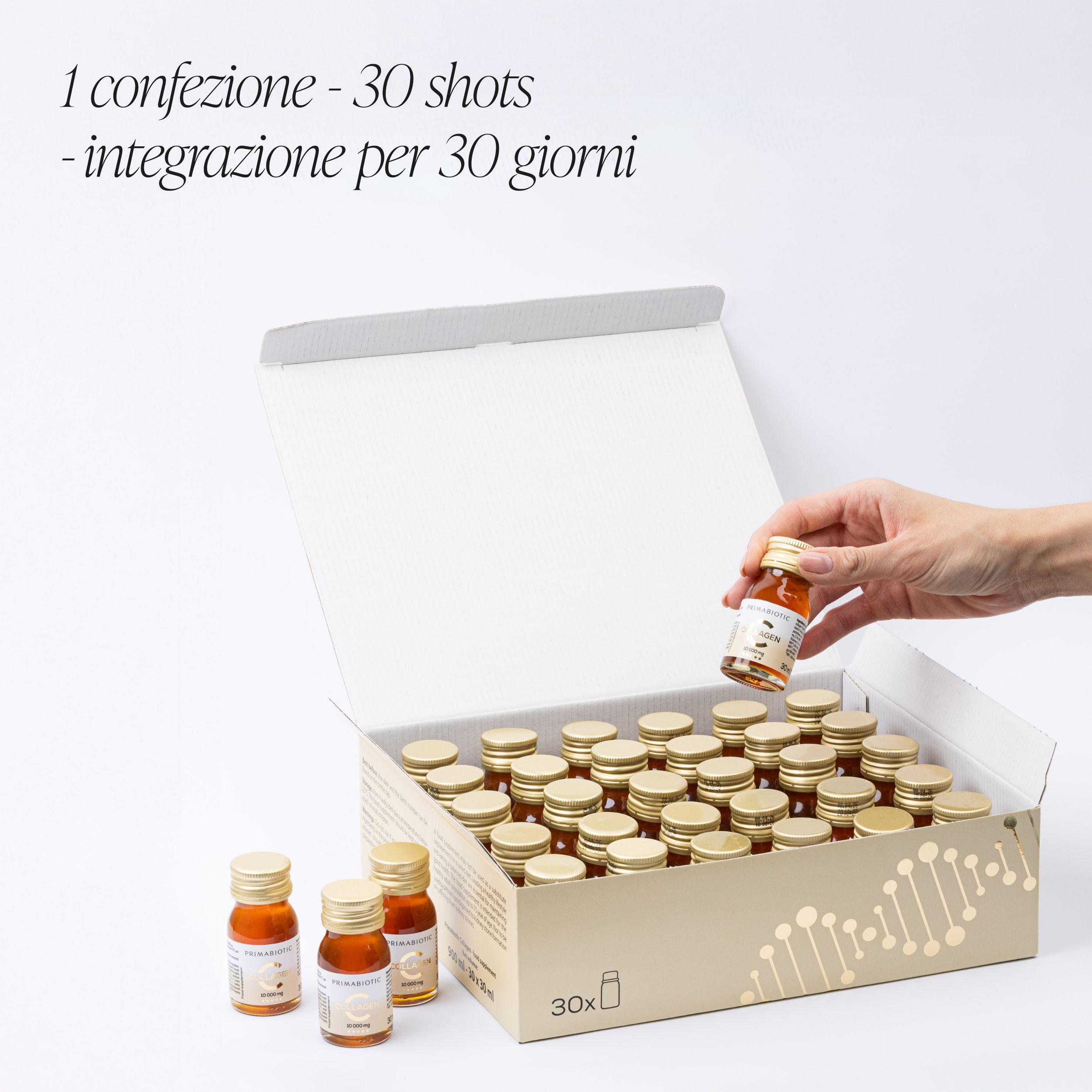Scatola aperta di shot di collagene Primabiotic. Una mano tiene una bottiglia. Scritta: 30 shots.