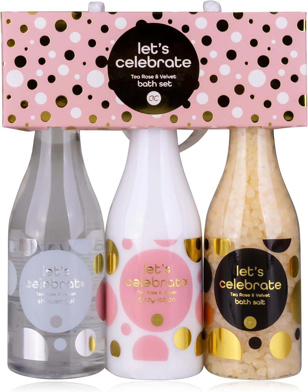Tre bottiglie in una confezione regalo. Scritta: Let's Celebrate. Prodotti: gel doccia, lozione mani e corpo, sali da bagno. Confezione rosa.