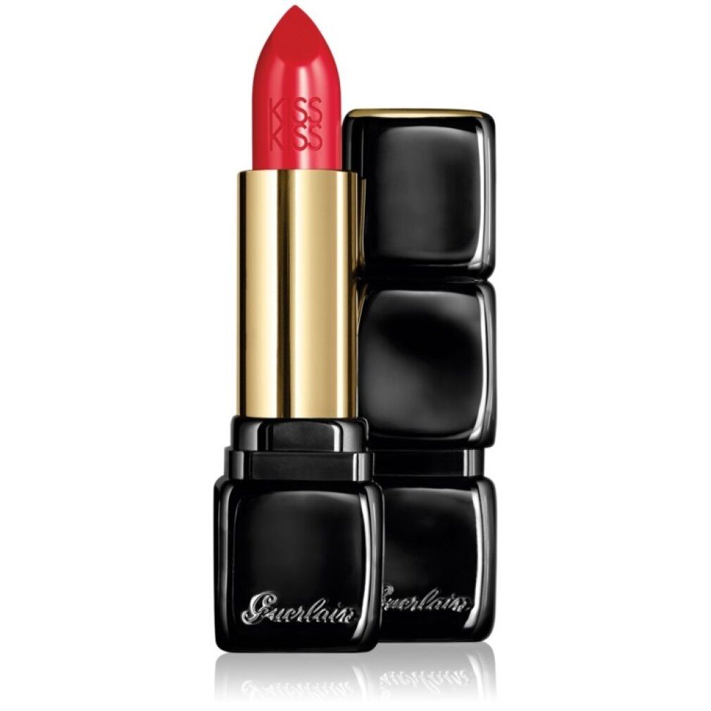 Rossetto rosso con astuccio dorato e custodia nera quadrata. Marchio Guerlain, scritta KissKiss.
