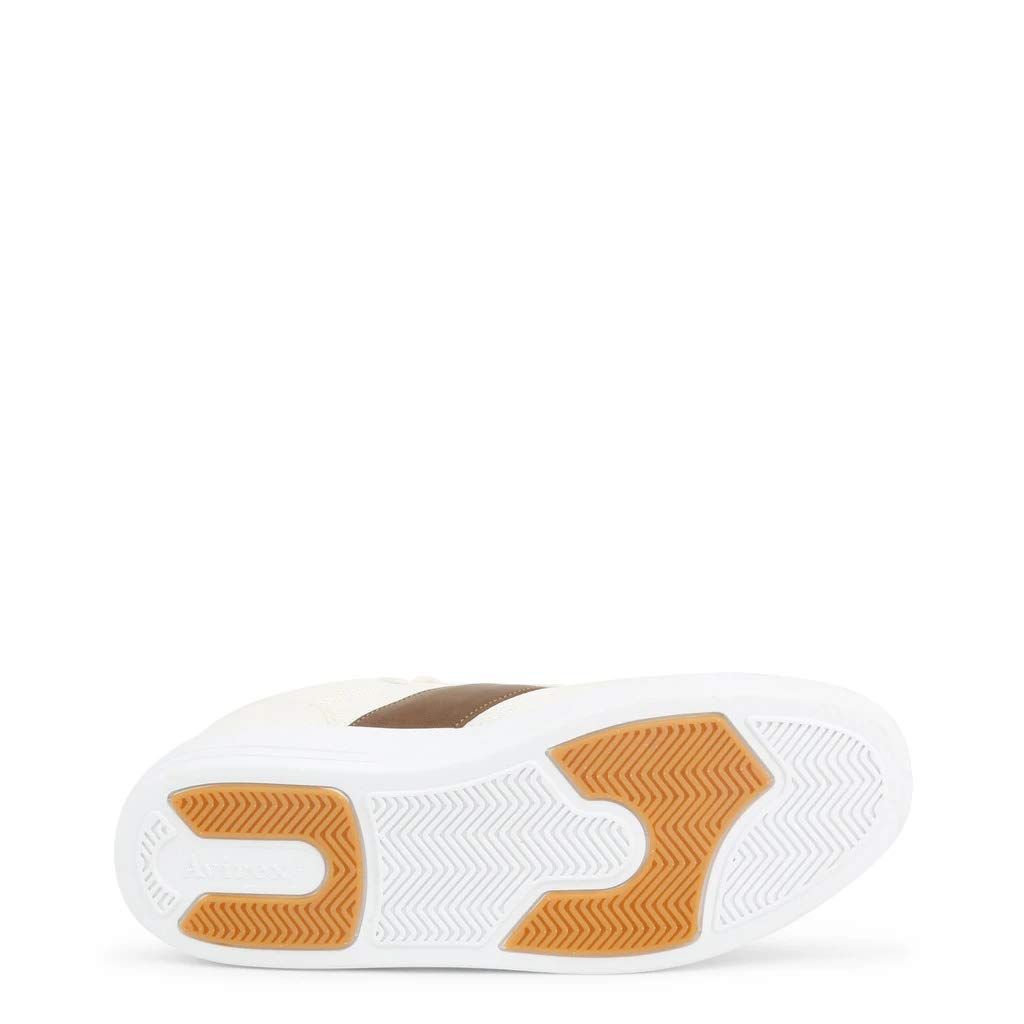 Suola di sneakers bianche con accenti marroni. Profilo sagomato.