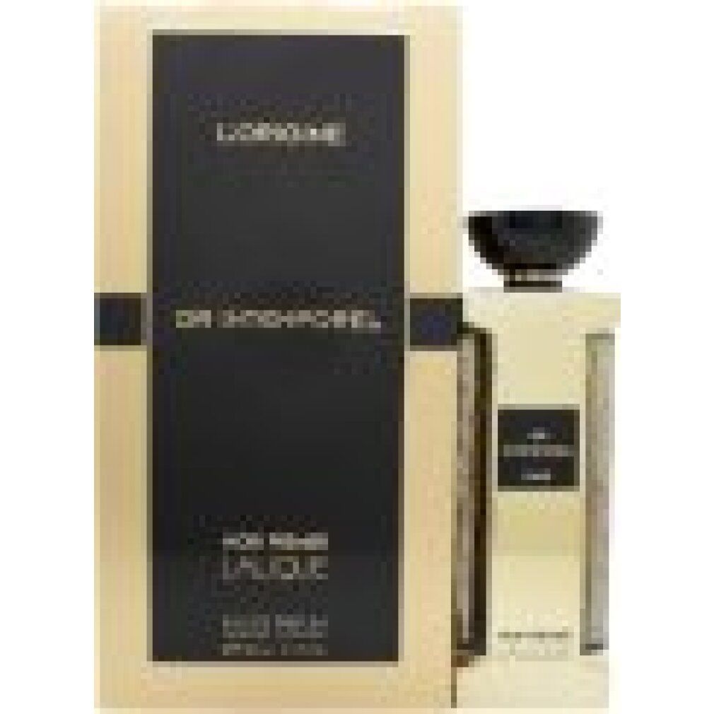 Flacone e confezione dorati. Tappo nero. Testo: L'ORIGINE, OR INTEMPOREL, NOIR PREMIER, LALIQUE. Eau de Parfum.