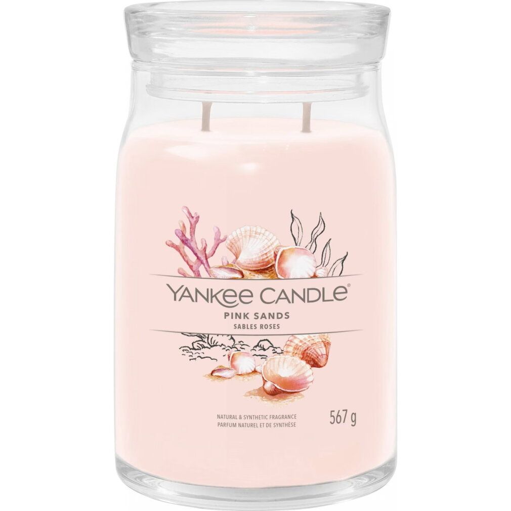 Grande candela in vetro rosa con motivo a conchiglia. Contiene due stoppini e un coperchio.