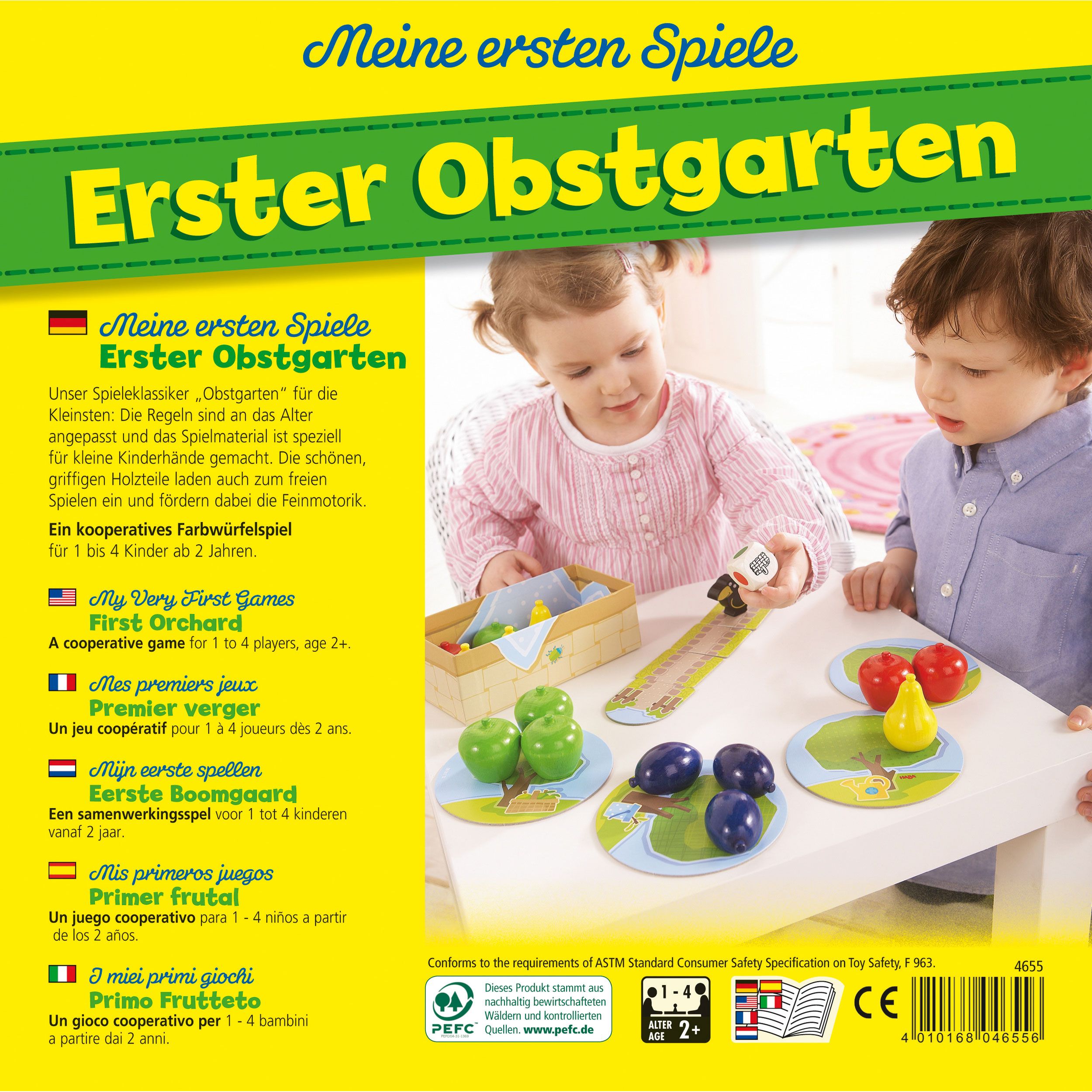 Retro della confezione del gioco. Testo: Meine ersten Spiele, Erster Obstgarten. Istruzioni del gioco in diverse lingue. Bambini che giocano.
