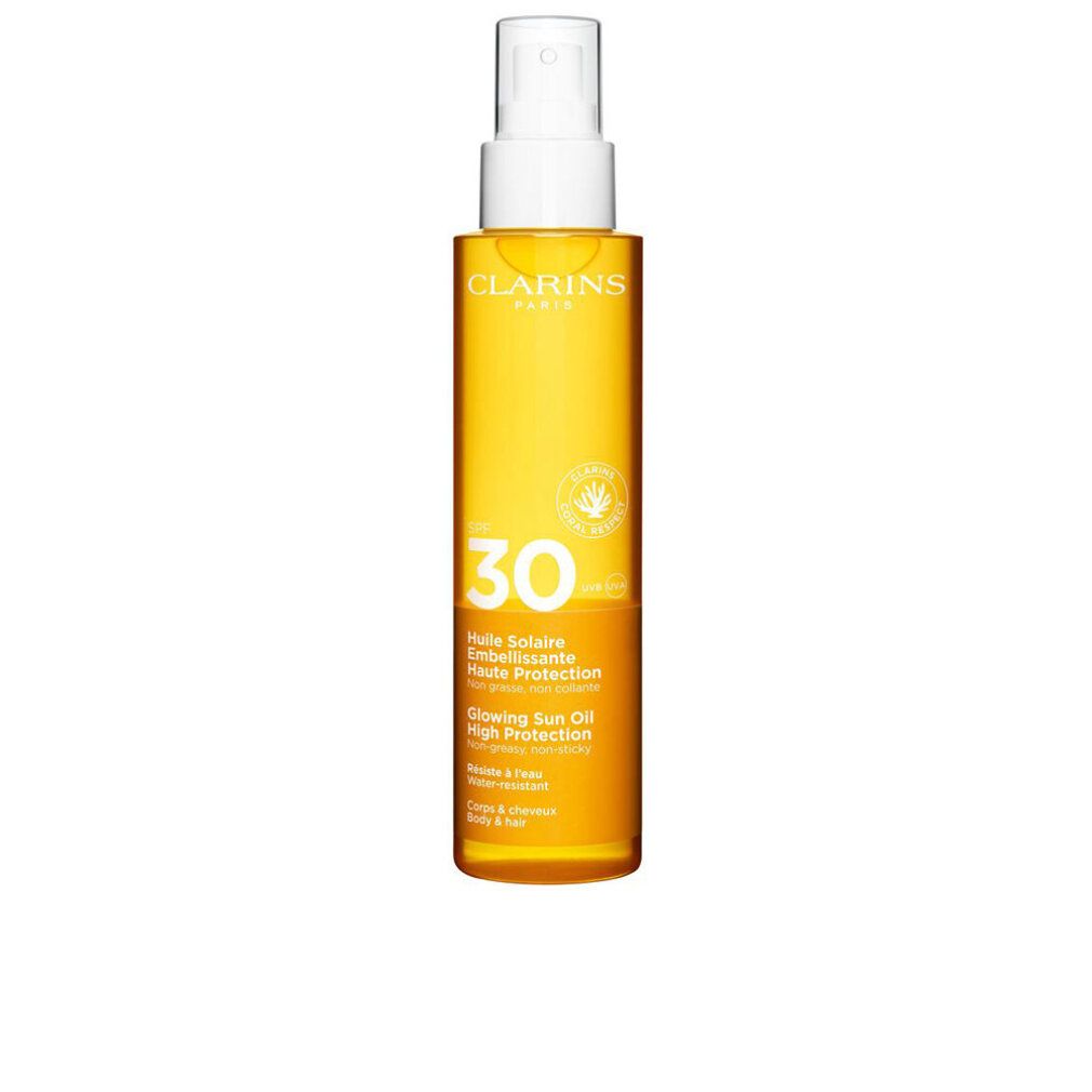 Spray olio solare con erogatore bianco. Flacone giallo con SPF 30. Logo Clarins e nome del prodotto.