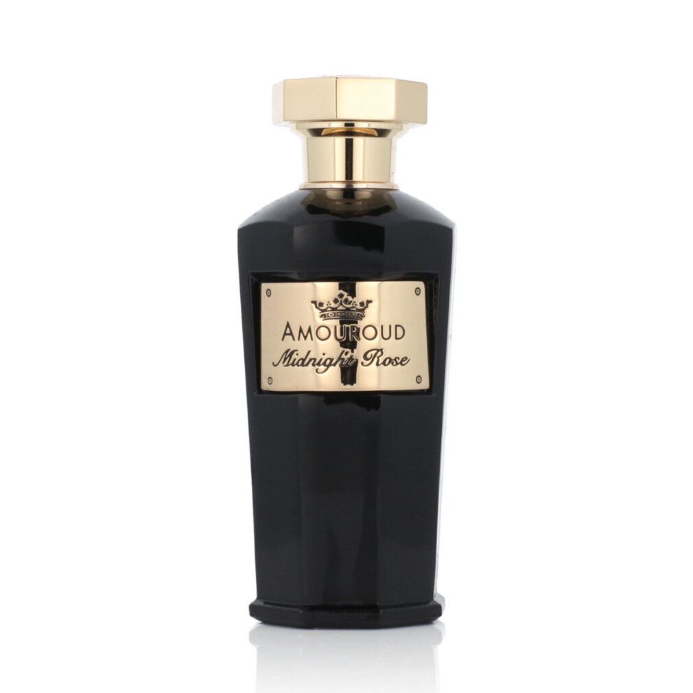 Flacone nero con tappo dorato. Scritta: Amouroud Midnight Rose.