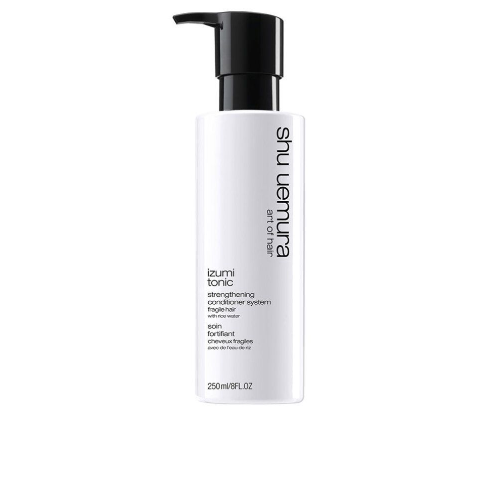 Flacone bianco con dosatore nero. Scritta: Izumi Tonic, Strengthening Conditioner System, Shu Uemura Art of Hair. 250ml/8FL.oz.