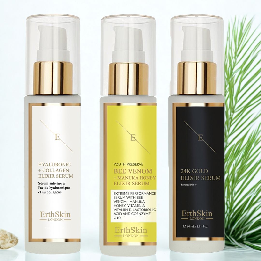 Tre flaconi di siero con dosatore a pompa. Etichette: Acido Ialuronico + Collagene, Veleno d'Ape + Miele di Manuka, Oro 24K. Marchio: ErthSkin London.