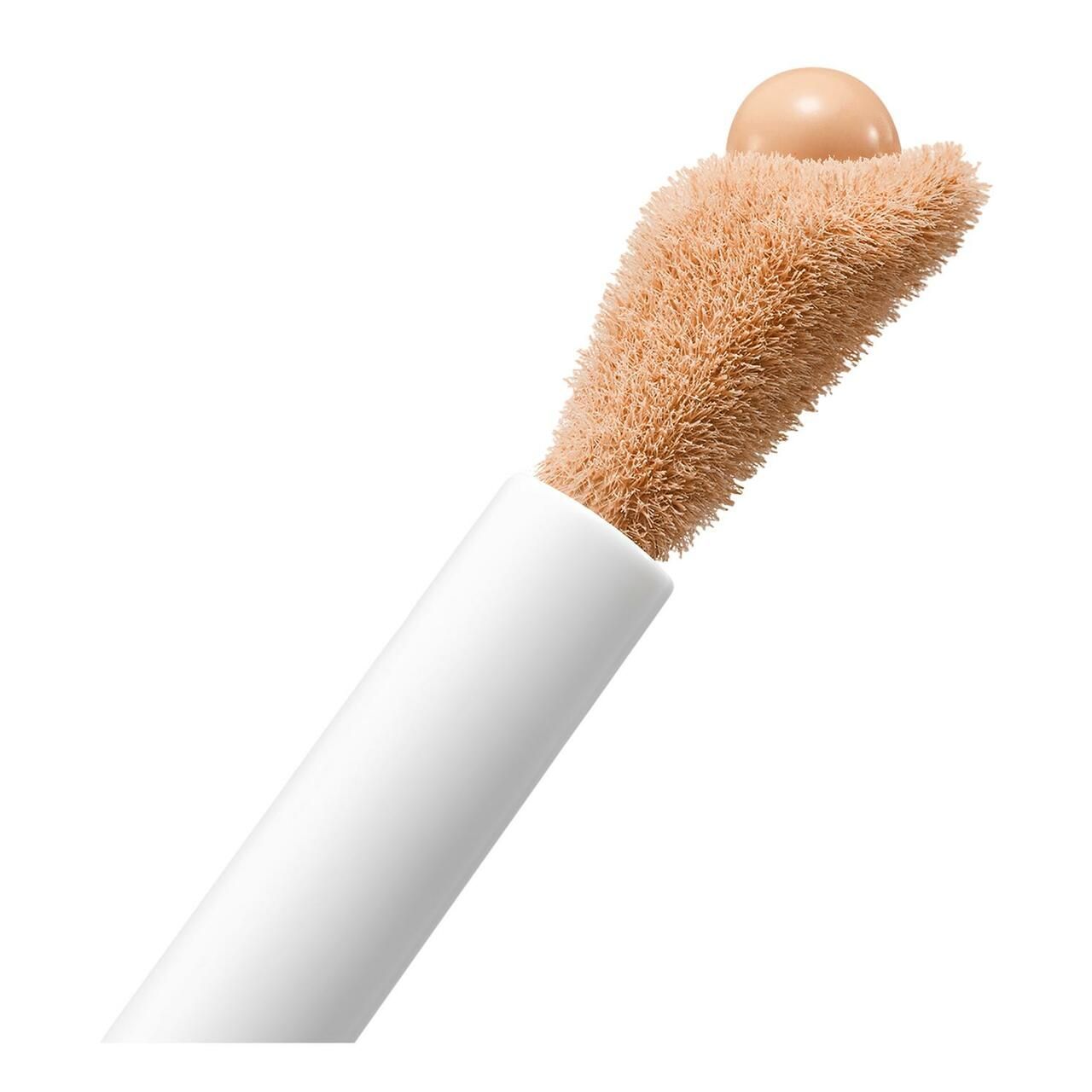 Applicatore correttore Lancôme. Punta in spugna con prodotto. Manico bianco.