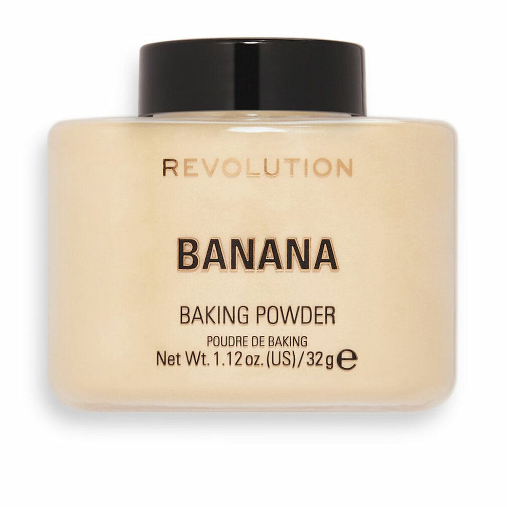 Contenitore di polvere beige con coperchio nero. Scritta: REVOLUTION, BANANA, BAKING POWDER, Net Wt. 1.12 oz. (US)/32g e.