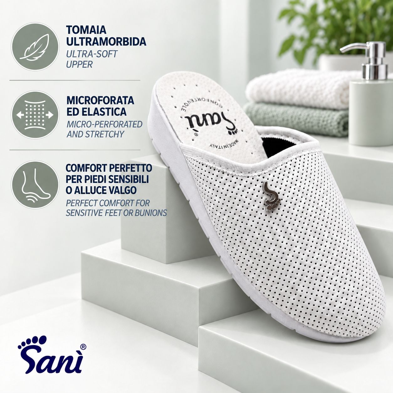Pantofola bianca microforata con tomaia ultra-morbida e suola antiscivolo.
