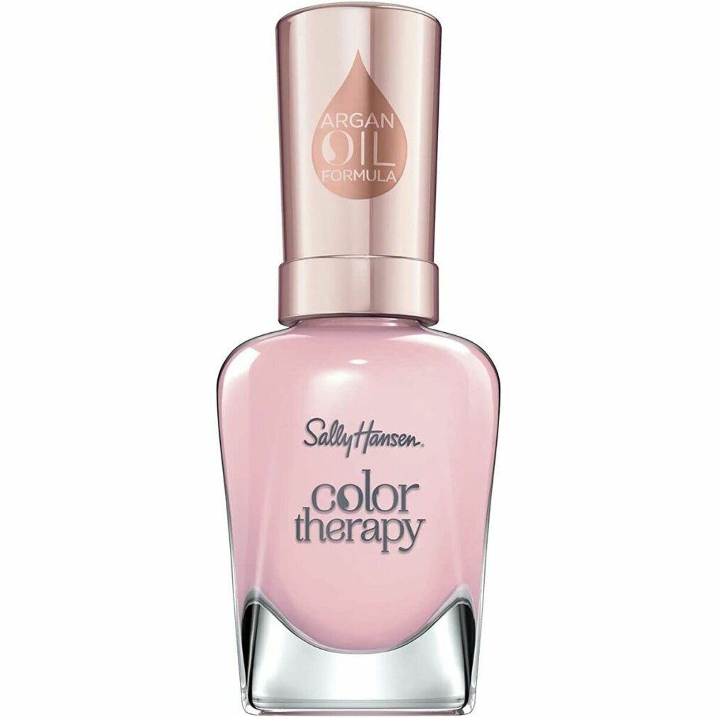 Flacone di smalto rosa chiaro. Scritta: Sally Hansen Color Therapy. Tappo con logo formula all'olio di argan.