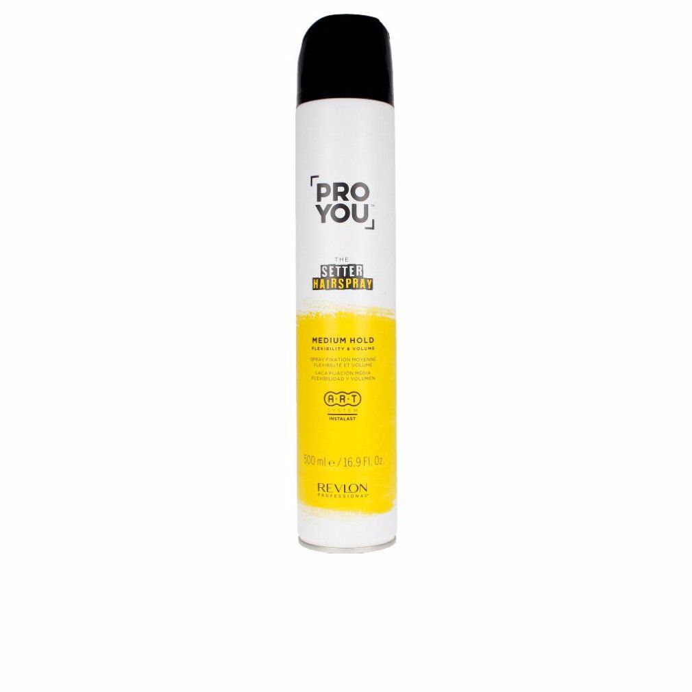 Bomboletta spray per capelli. Bianco, giallo e nero. Scritta: PRO YOU, SETTER HAIRSPRAY, MEDIUM HOLD. Marca: Revlon.