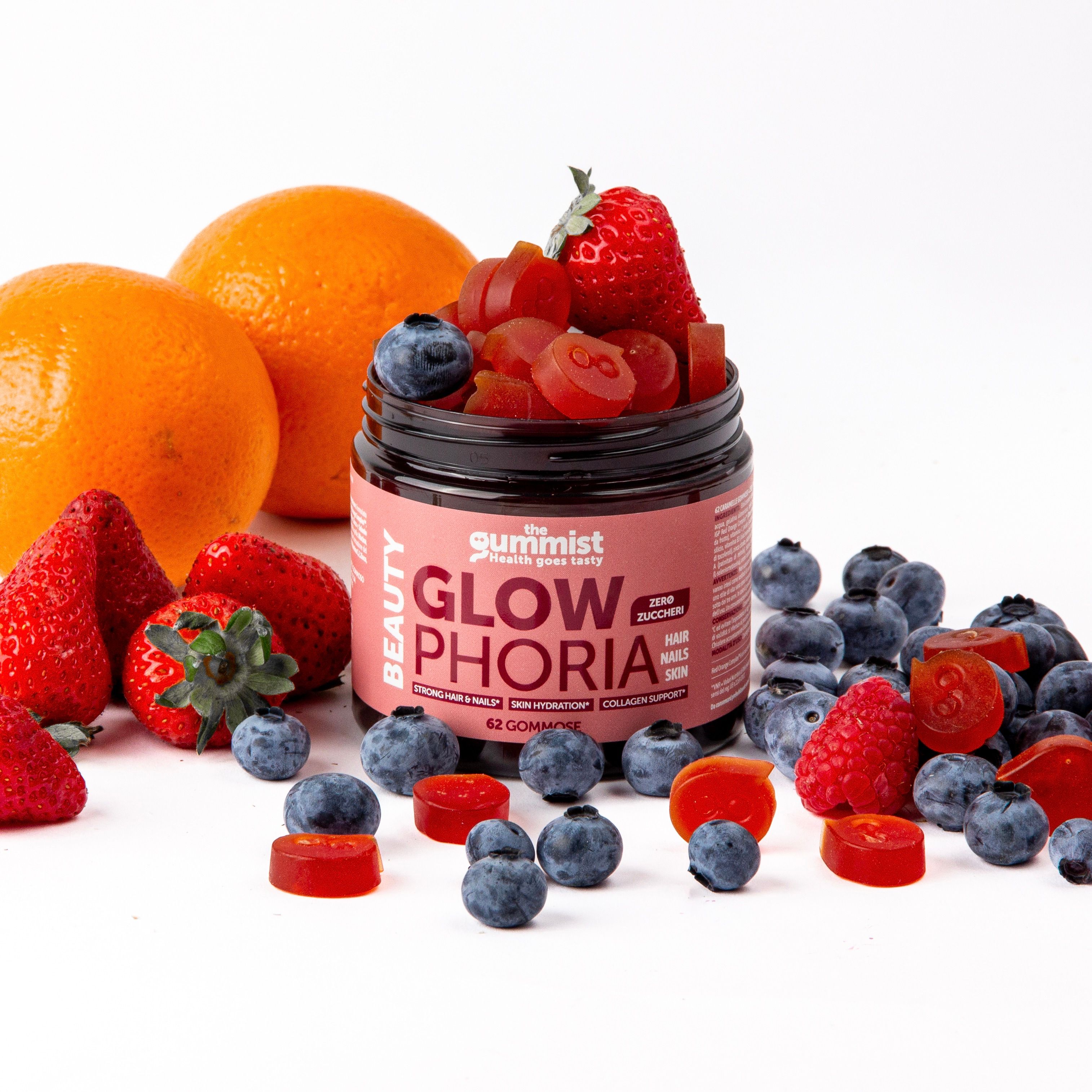 Barattolo di caramelle gommose con frutta. Scritta: Glowphoria. Contiene mirtilli, fragole e arance.