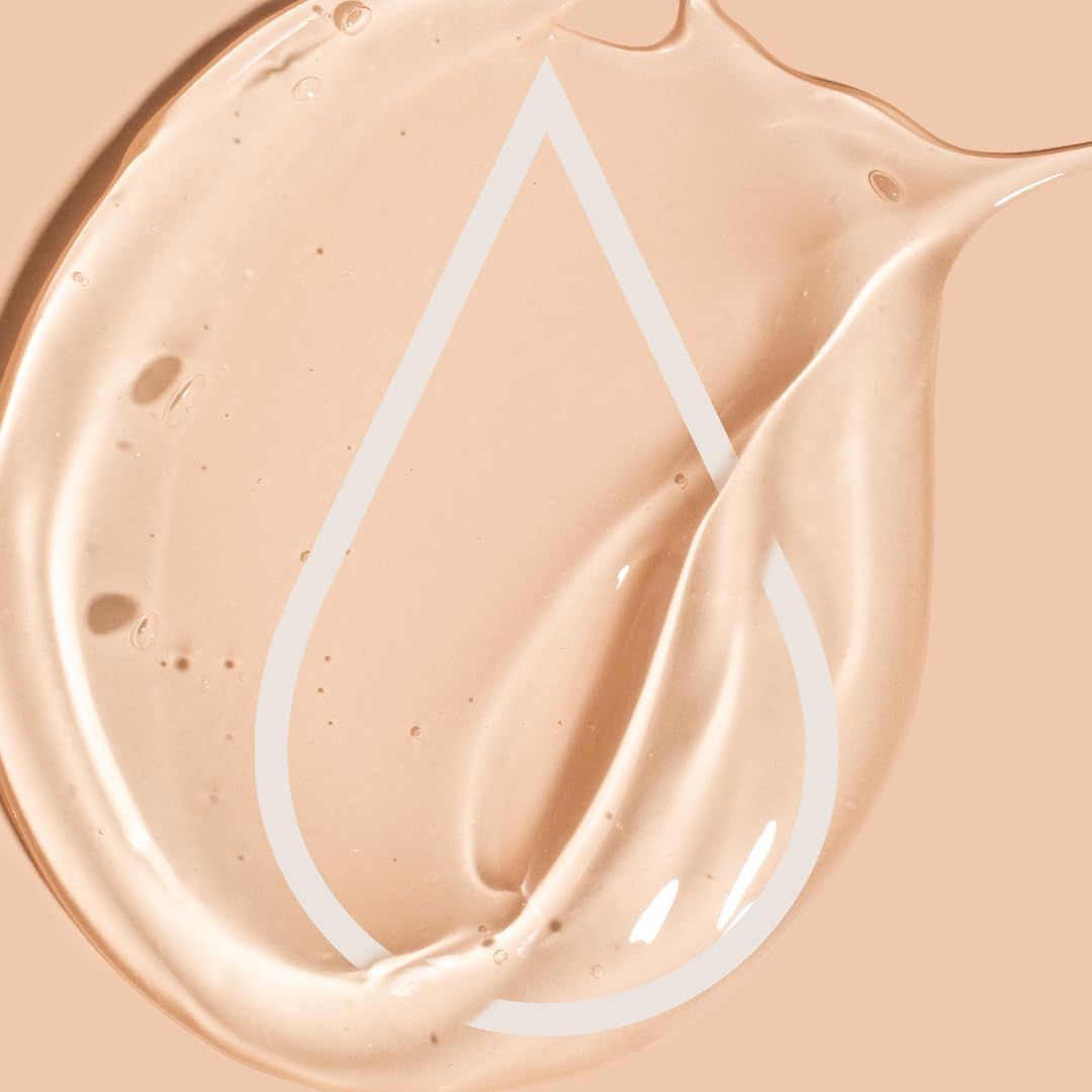 Primo piano di una sostanza gelatinosa con grafica a contorno di goccia bianca. Colorazione beige chiaro.