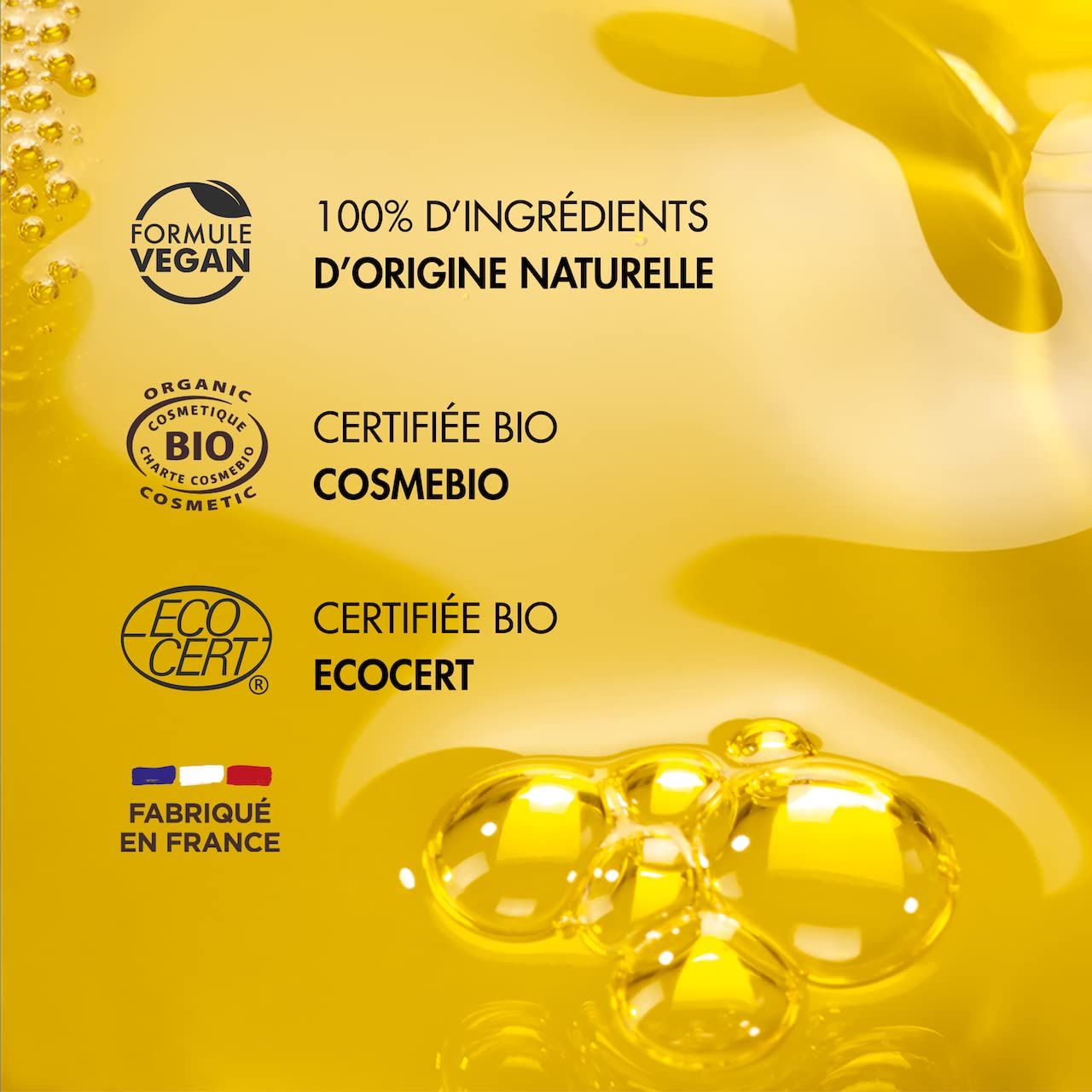 Olio giallo con loghi: Formula Vegan, 100% ingredienti naturali, certificazioni Cosmebio ed Ecocert, prodotto in Francia.