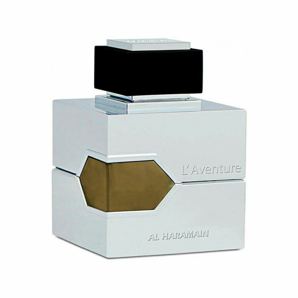 Flacone argento, tappo nero. Scritta L'Aventure e Al Haramain.