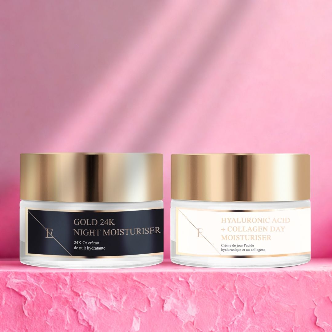 Due vasetti di crema con coperchi dorati. A sinistra: Gold 24K Night Moisturiser. A destra: Hyaluronic Acid + Collagen Day Moisturiser. Sfondo rosa.