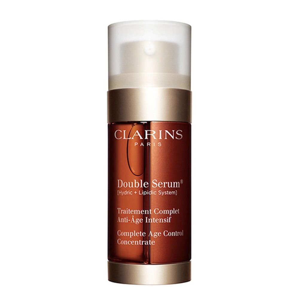 Flacone di siero con dosatore. Liquido marrone visibile. Testo: Clarins, Double Serum, Anti-Age.