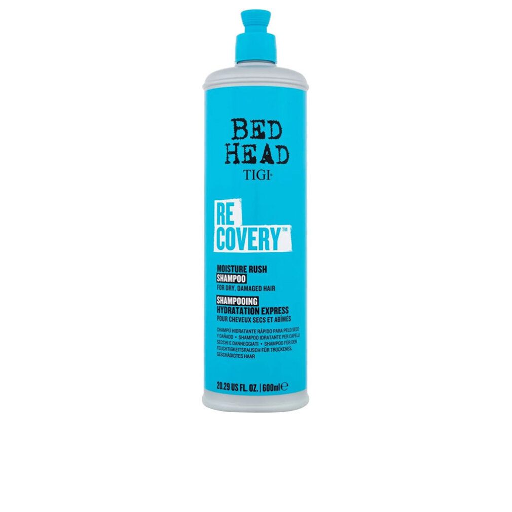 Flacone di shampoo turchese con tappo bianco. Scritta: Bed Head Tigi Re-covery Moisture Rush Shampoo. Per capelli secchi e danneggiati.