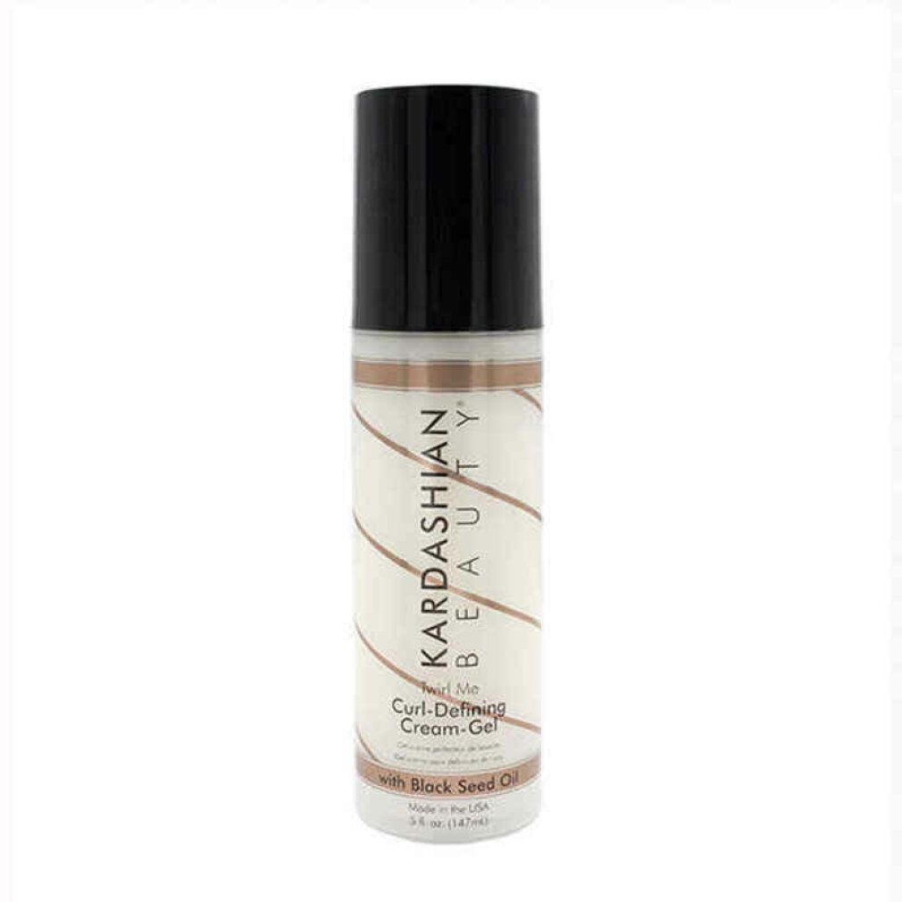 Flacone cilindrico con tappo nero. Scritta: KARDASHIAN BEAUTY, Curl-Defining Cream-Gel, con Black Seed Oil. Strisce bianche e marroni.