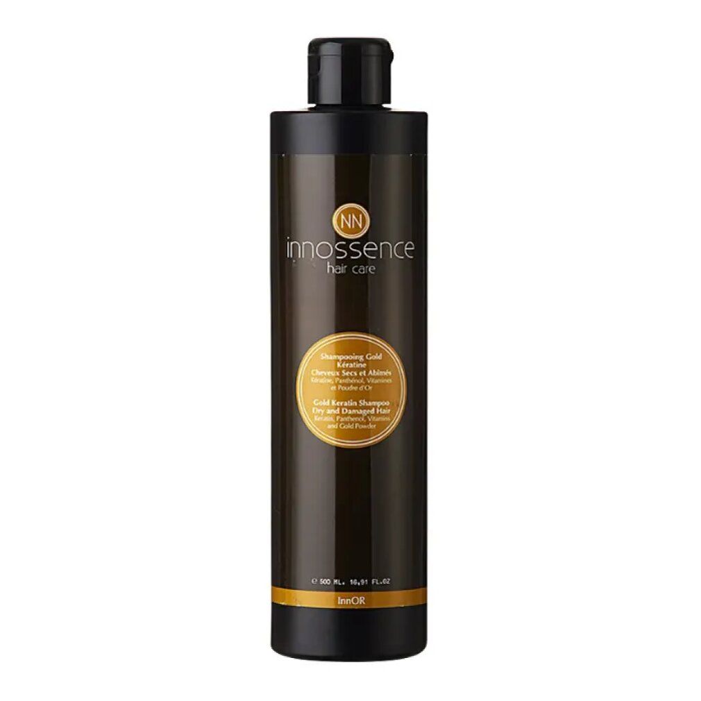 Flacone marrone scuro con tappo nero. Etichetta dorata con testo. Marchio: innosense hair care. Prodotto: Shampoo Gold Keratin.