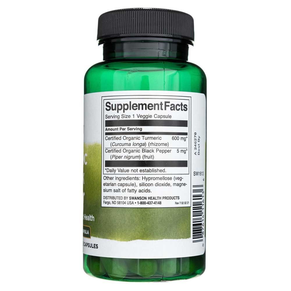 Retro di un flacone verde di curcuma e pepe nero Swanson. Mostra informazioni nutrizionali e ingredienti.