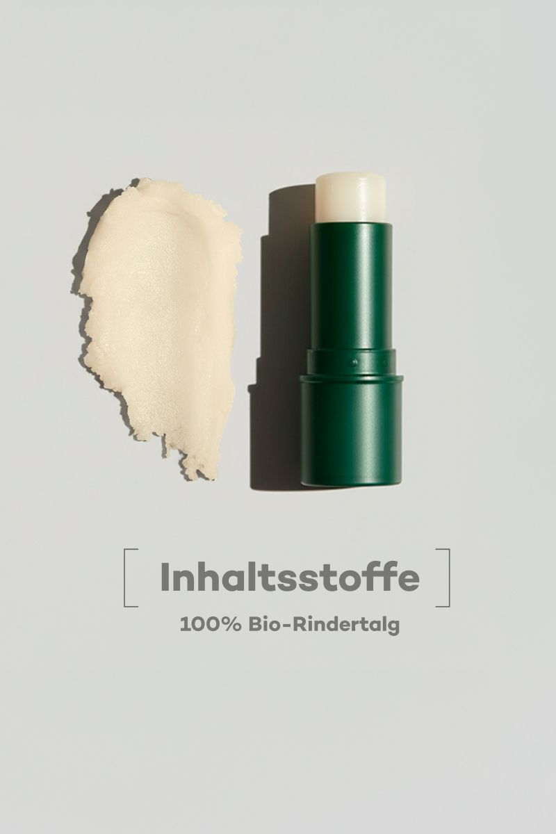 Stick di balsamo per labbra verde accanto a una macchia di balsamo giallo. Testo: Ingredienti, 100% sego di manzo biologico.