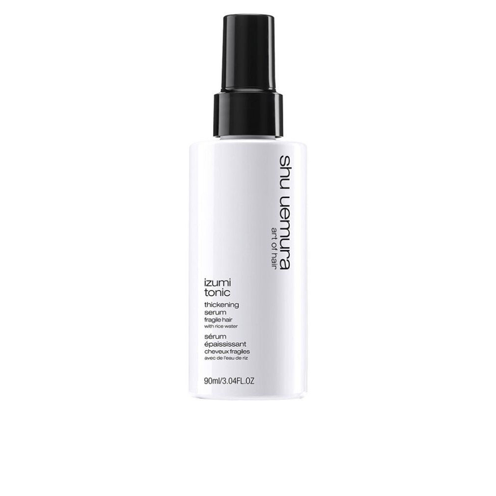 Flacone bianco con erogatore nero. Scritta: izumi tonic thickening serum, Shu Uemura Art of Hair.