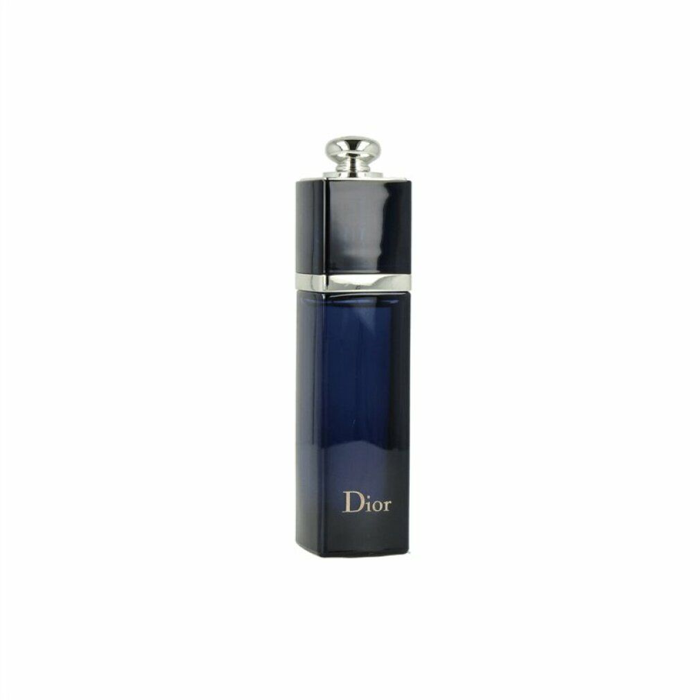 Flacone Dior Addict Eau de Parfum. Flacone blu scuro con tappo argentato. Scritta Dior.