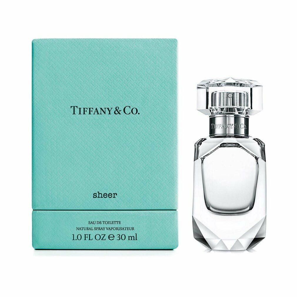 Scatola turchese e flacone di profumo. "Tiffany & Co." e "sheer" sulla scatola. Flacone trasparente con tappo sfaccettato.