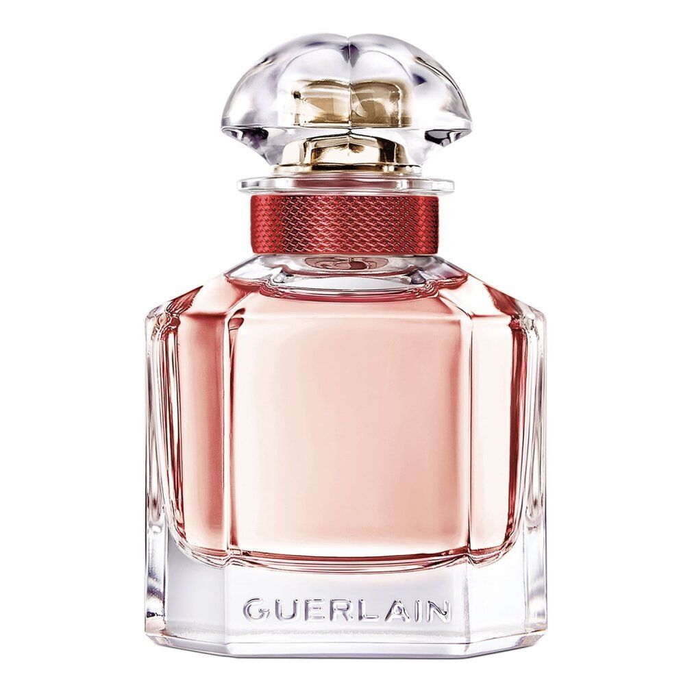 Flacone di Mon Guerlain Eau de Toilette Bloom of Rose. Forma quadrata, liquido rosa, tappo trasparente. Collo dorato.