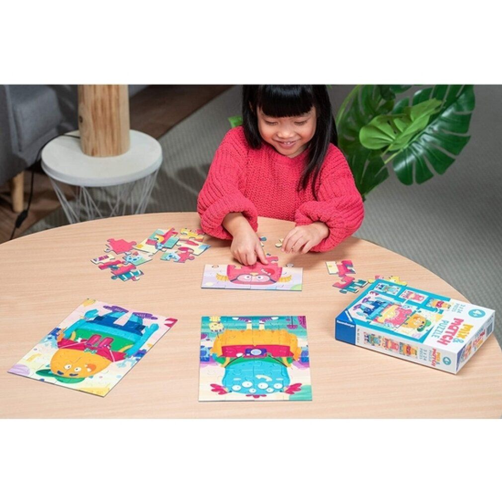 Bambina che gioca con i puzzle su un tavolo. I puzzle mostrano illustrazioni di mostri. Scatola del puzzle con il logo Mix & Match Puzzle e il logo Ravensburger.