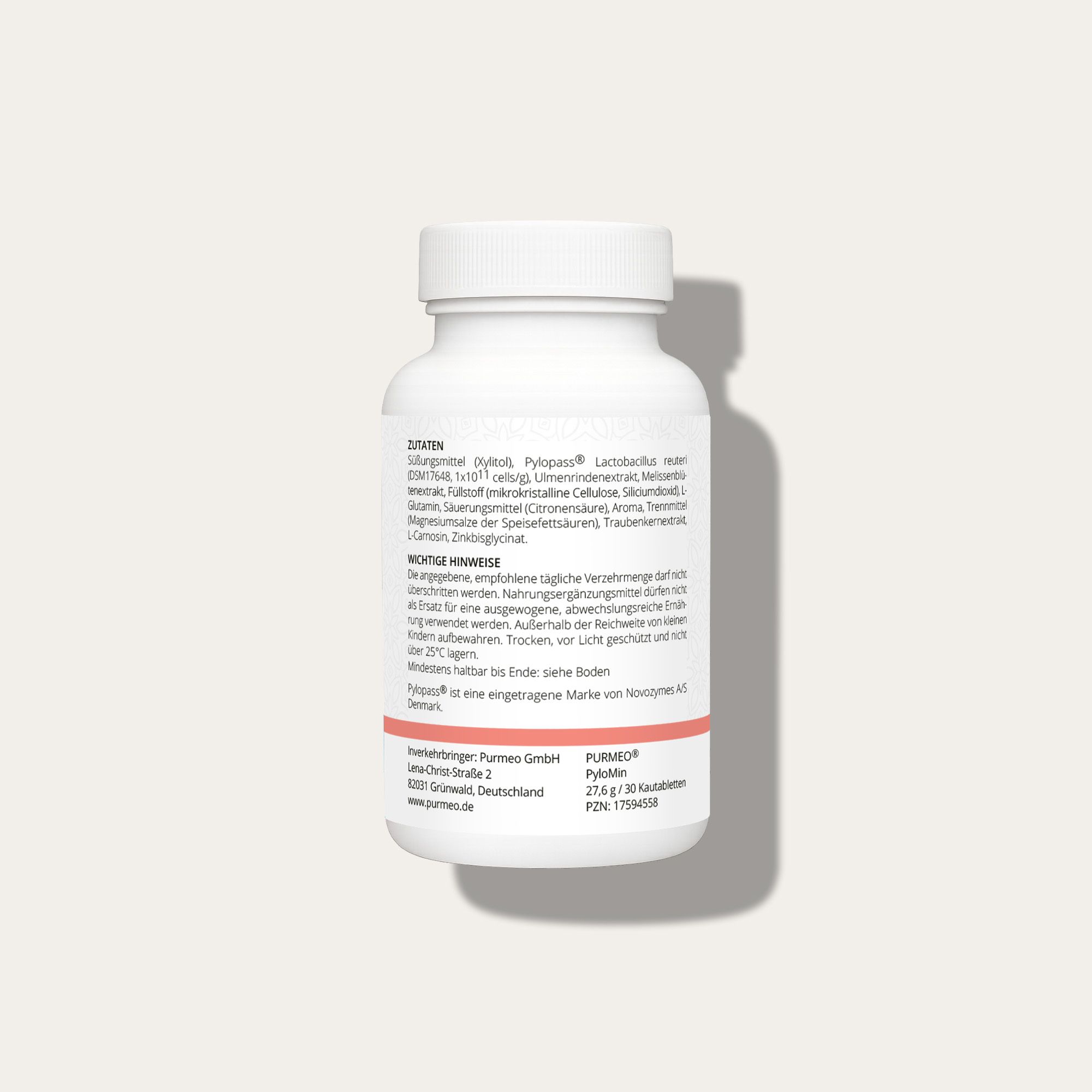 Flacone bianco con etichetta rosa. Contiene elenco ingredienti e informazioni importanti. Prodotto in Germania.