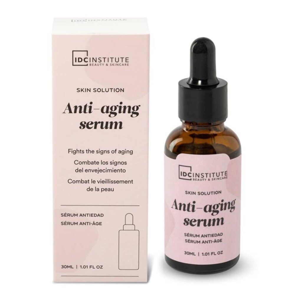 Prodotto e confezione. Flacone marrone con contagocce nero. Etichetta rosa con testo: Anti-aging serum. Marchio: IDC INSTITUTE.