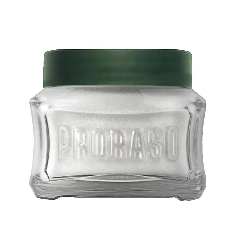 Barattolo di vetro con coperchio verde. Il nome del prodotto è impresso sul vetro.
