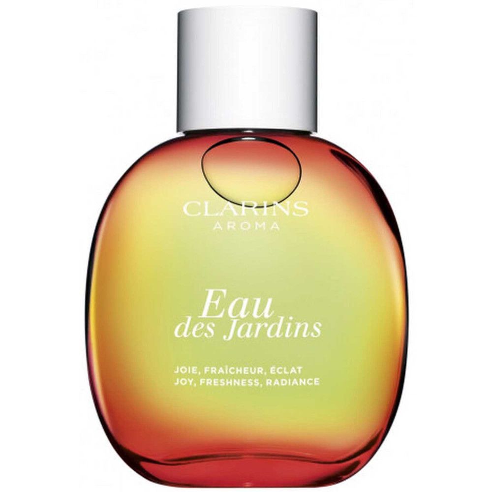 Flacone rotondo con tappo bianco. Scritta: Eau des Jardins, Clarins Aroma. Sfumatura giallo-rossa.