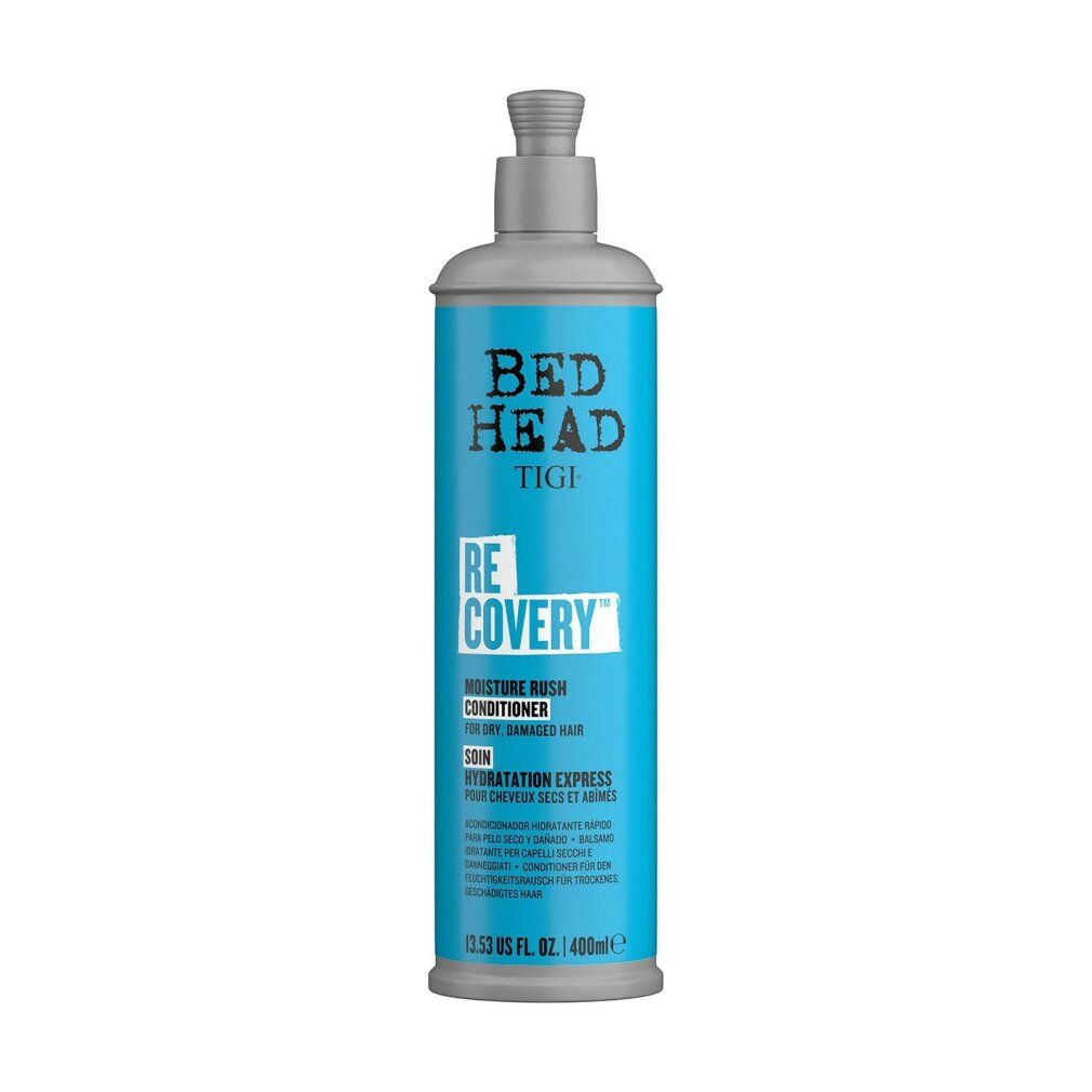 Flacone blu con etichetta. Scritto: Bed Head, TIGI, Recovery. Balsamo idratante per capelli secchi e danneggiati. 400ml.
