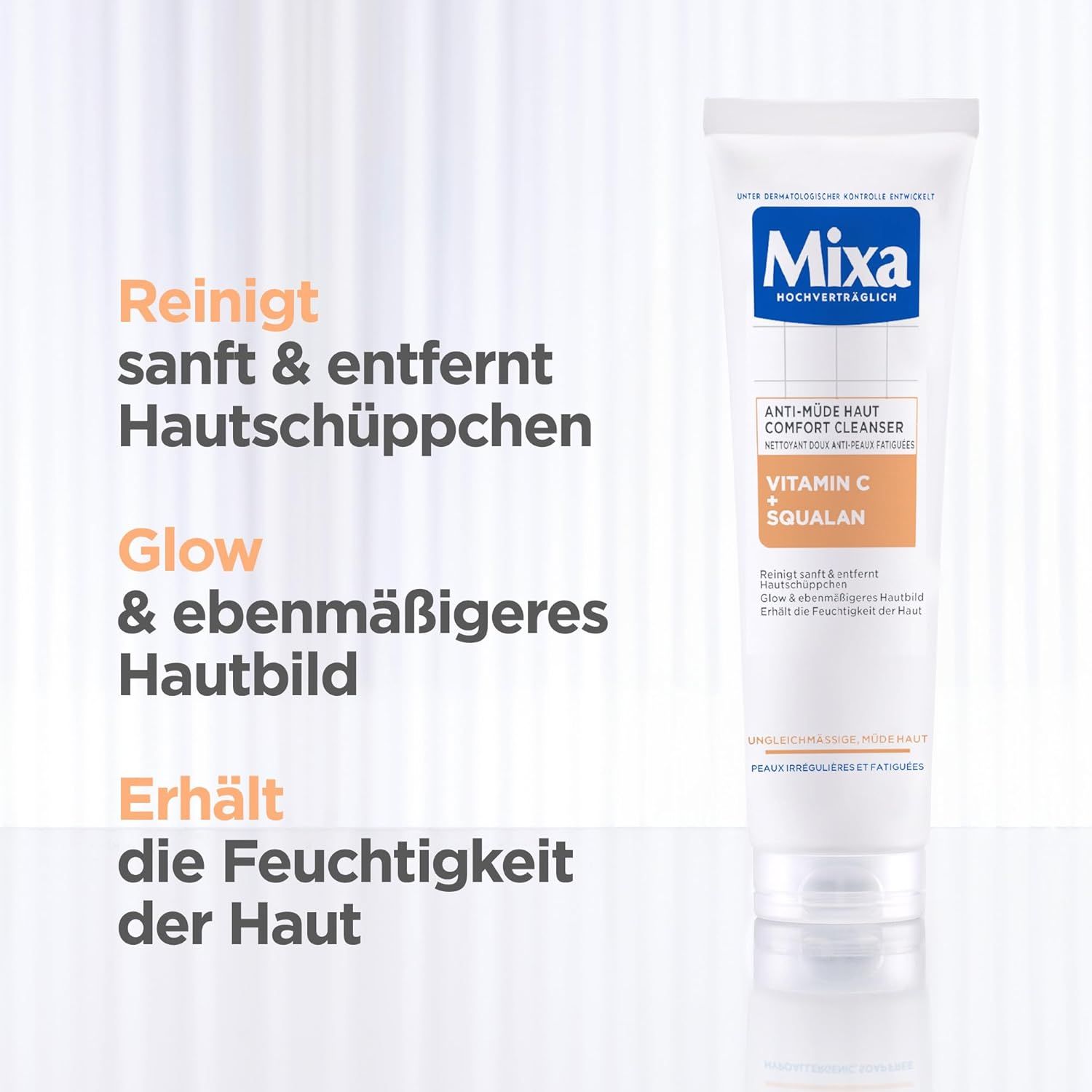 Tubo bianco Mixa Anti-Müde Haut Comfort Cleanser. Testo: Pulisce delicatamente, rimuove le scaglie, luminosità, incarnato uniforme.