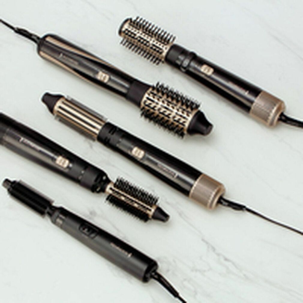 Diversi Remington Multi-Warmluftstyler con diversi accessori. Nero e oro. Accessori e dispositivi con cavo.