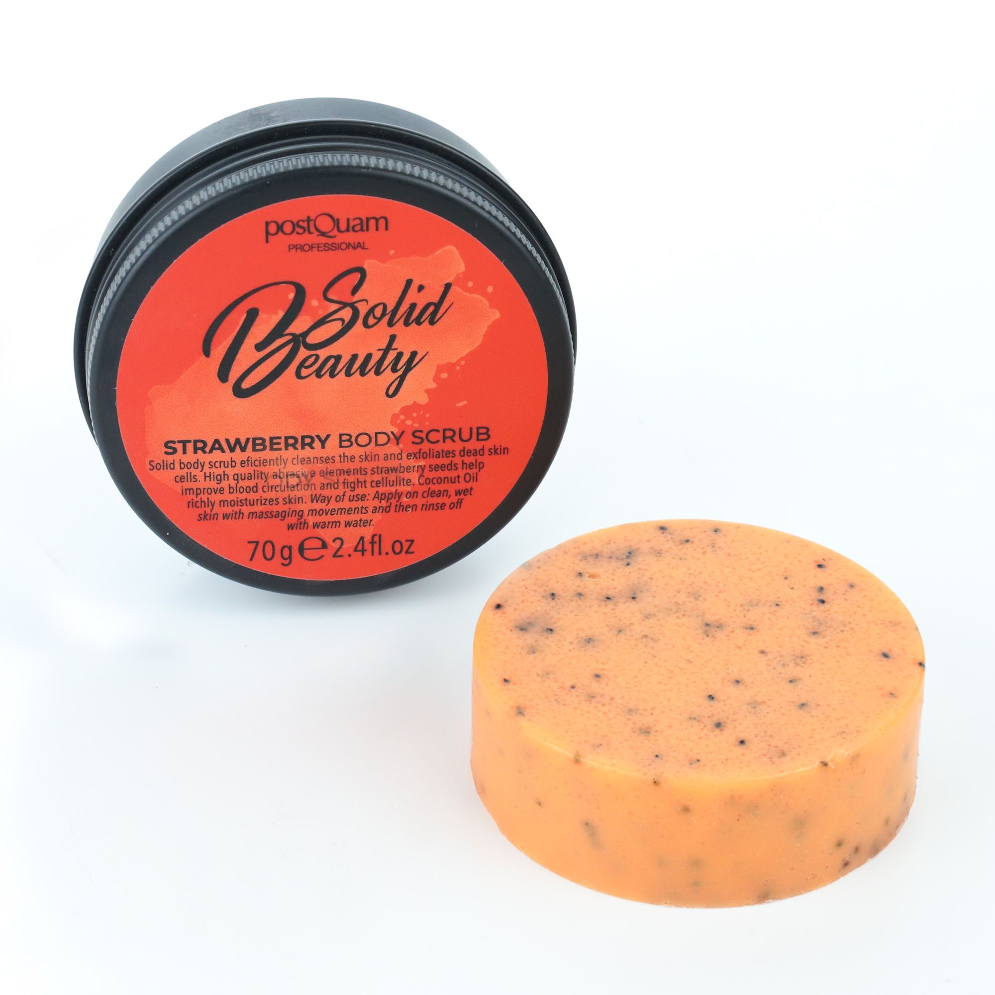 Barattolo rotondo e scrub corpo alla fragola. Bordo nero, coperchio rosso. Scrub arancione accanto.
