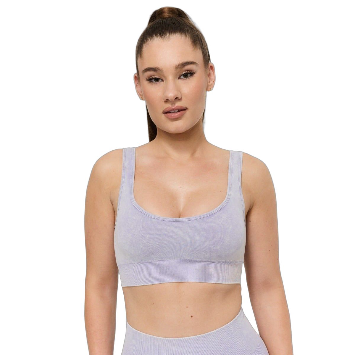 Reggiseno sportivo senza cuciture viola con spalline larghe e scollo a U, vista frontale.
