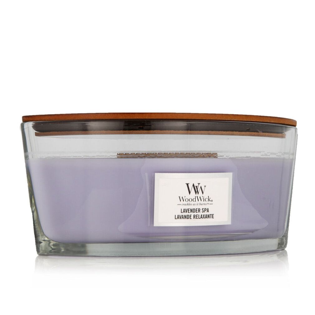 Candela ellittica con coperchio in legno. Cera viola in contenitore di vetro. Scritta: WoodWick, Lavender Spa, Lavande Relaxante.