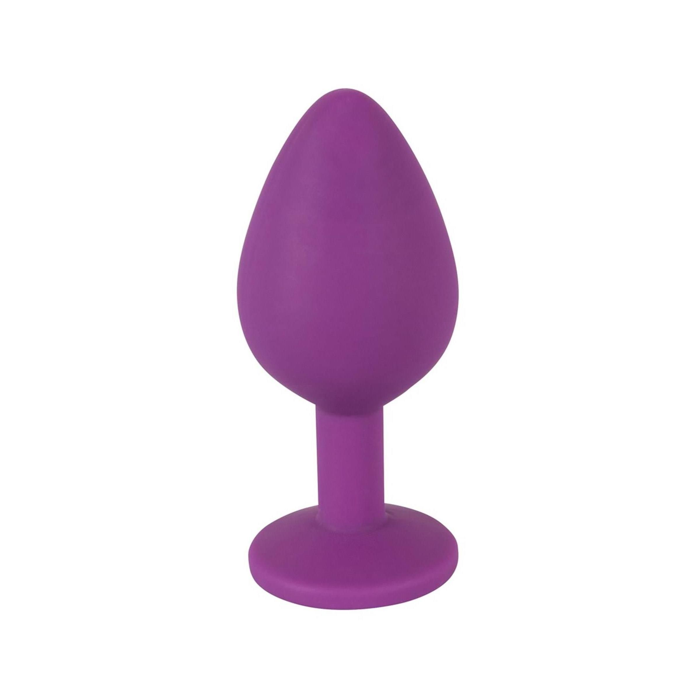 Plug viola. Forma conica, base rotonda. In posizione verticale.