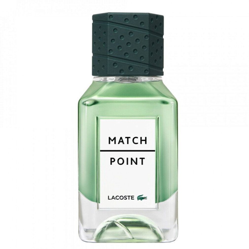 Flacone di eau de toilette verde con tappo verde. Etichetta bianca con testo. Forma quadrata.